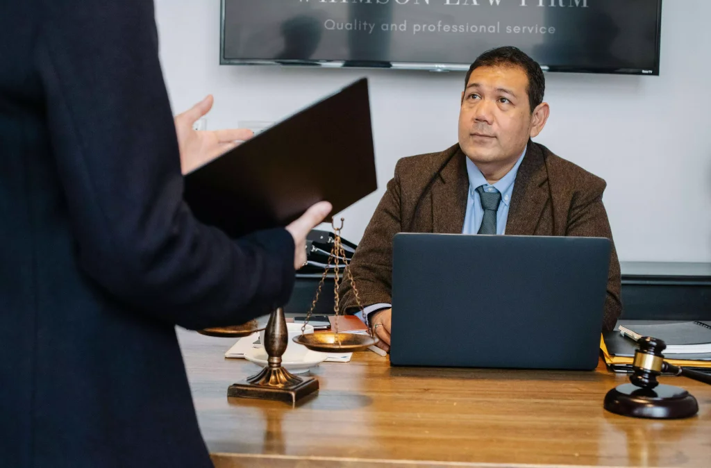 An attorney talking to a client (maybe)